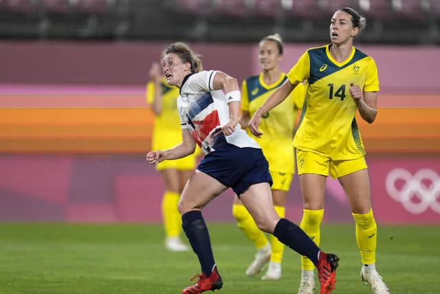On target: Ellen White celebrates scoring her side's opening goal against Australia.