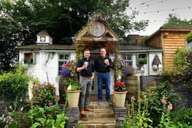 Peter Speight and head distiller Daniel Shepherd outside their garden distillery