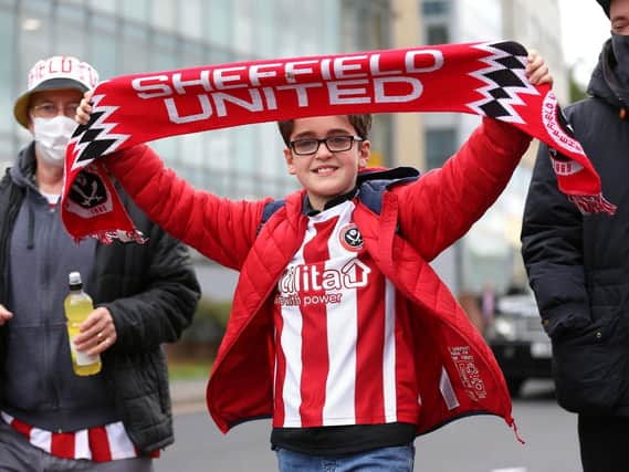 Fans outside of the ground before the final Premier League match at Bramall Lane, Sheffield in May. Full stadiums are returning this weekend for the new Championship season. Photo: Nigel French/PA Wire