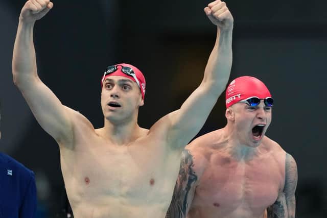 DOUBLE GOLD: Adam Peaty, right, and James Guy, left, bagged their second golds of Tokyo 2020. Picture: Getty Images.