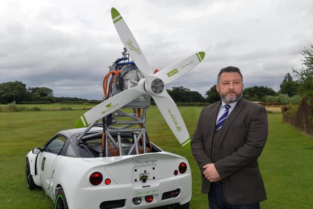 Barry Jones at Condor Aviation's site near Selby with a car mounted with a contra-rotating propellor propulsion system Picture: Jonathan Gawthorpe