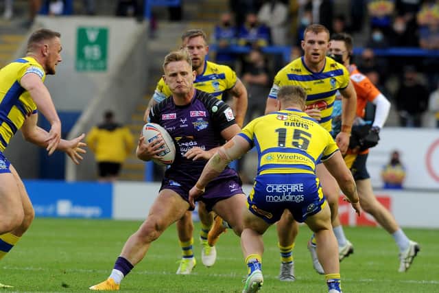 FAMILIAR FACES: Brad Dwyer comes up against former club Warrington Wolves earlier this month. Picture: Simon Hulme.