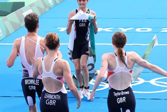 FINISH LINE: Alex Yee crosses in first place to give Great Britain gold in the mixed triathlon relay in Tokyo. Picture: Getty Images.