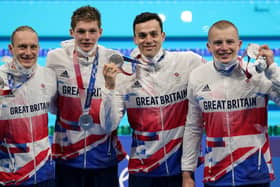 Great Britain's Luke Greenbank, Duncan Scott, James Guy and Adam Peaty after winning the silver medal in the Men's 4 x 100m Medley Relay at the Tokyo Aquatics Centre on the ninth day of the Tokyo 2020 Olympic Games in Japan. Picture: Joe Giddens/PA Wire.