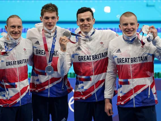 Great Britain's Luke Greenbank, Duncan Scott, James Guy and Adam Peaty after winning the silver medal in the Men's 4 x 100m Medley Relay at the Tokyo Aquatics Centre on the ninth day of the Tokyo 2020 Olympic Games in Japan. Picture: Joe Giddens/PA Wire.