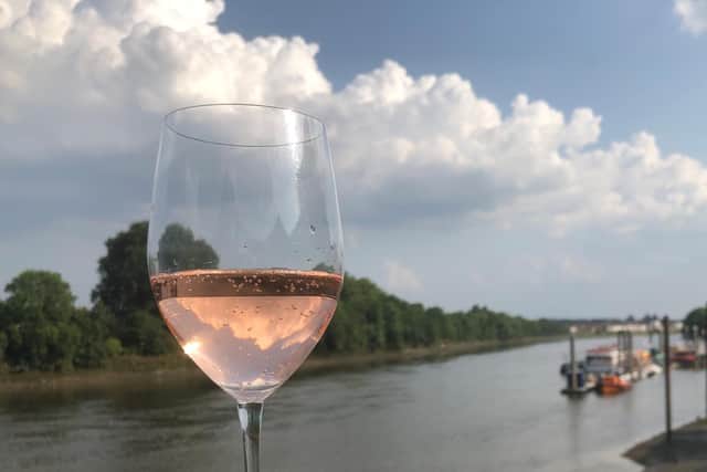 Pour yourself a glass of something refreshing on the riverside.