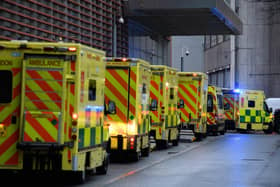 Ambulances queue outside a A&E unit earlier this year.