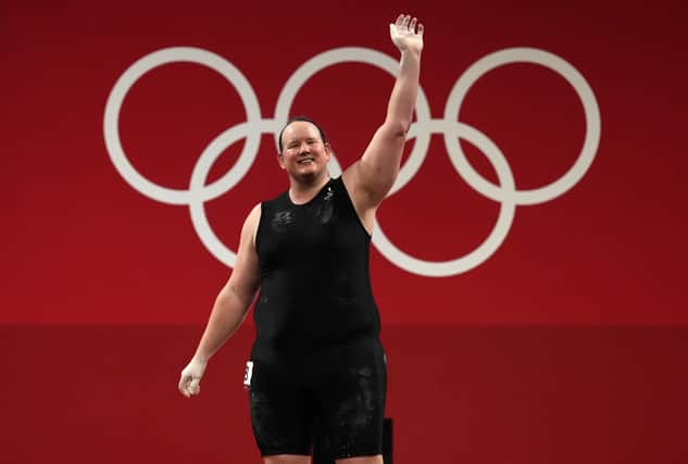 New Zealand's Laurel Hubbard waves to spectators in the Women's +87kg Group A Weightlifting at Tokyo international Forum on the tenth day of the Tokyo 2020 Olympic Games in Japan.