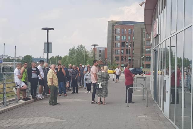 Fans queueing for season cards and match tickets at the New York Stadium on Tuesday.