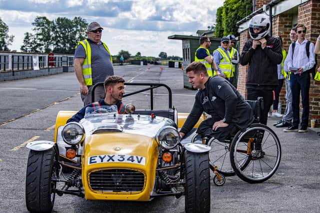 Driver George Adshead with his Lotus he found in a garden and restored, chats with Army veteran James Rose 2nd battalion Yorkshire Regiment  at Croft Motor Circuit.
 Picture Tony Johnson