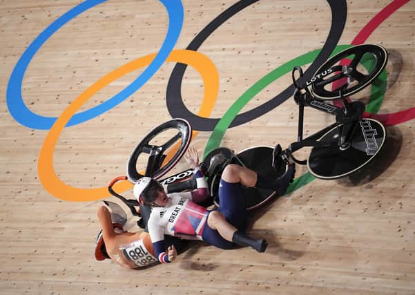 Collision: Leeds star Katy Marchant crashes with Laurine van Riessen of Team Netherlands during the track cycling women keirin. Picture: AP Photo/Christophe Ena