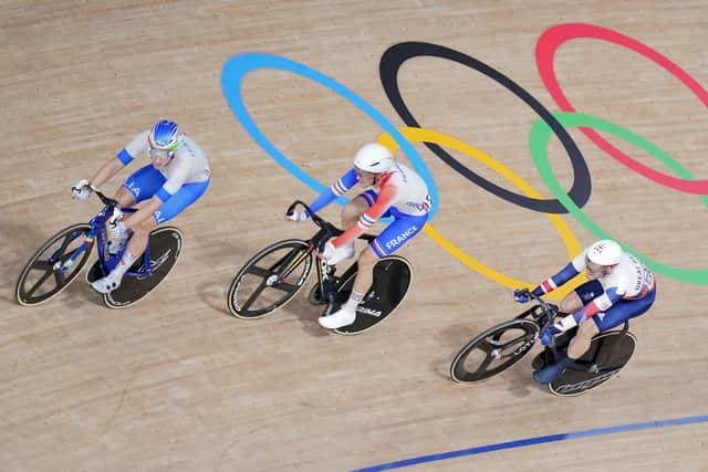 On track: Great Britain's Matthew Walls, right, heading for gold in the men's omnium.