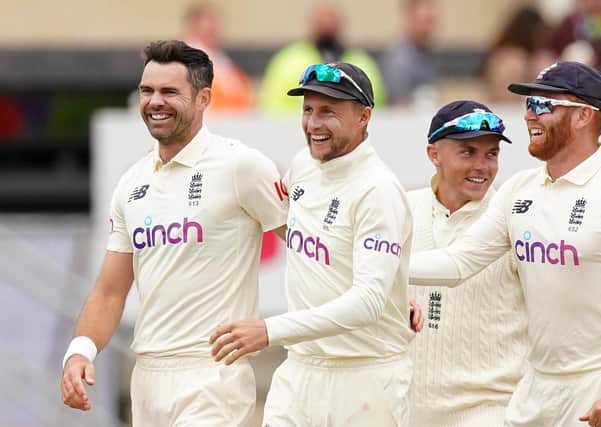 Golden moment: England's Jimmy Anderson celebrates the wicket of India's Virat Kohli with team-mate Joe Root. Picture: Tim Goode/PA Wire.