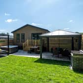 The new lodges feature Love Island-style day beds