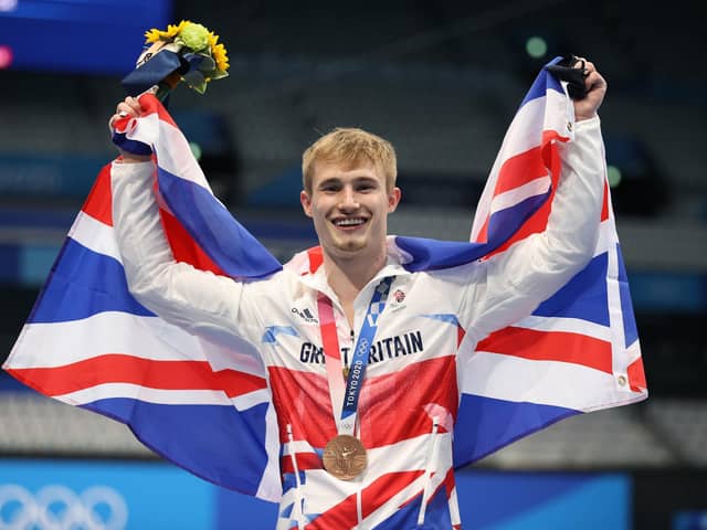 Great Britain's Jack Laugher celebrates on the podium with the bronze medal for the Men's 3m Springboard at Tokyo Aquatics Centre on the eleventh day of the Tokyo 2020 Olympic Games in Japan. Picture: Martin Rickett/PA Wire
