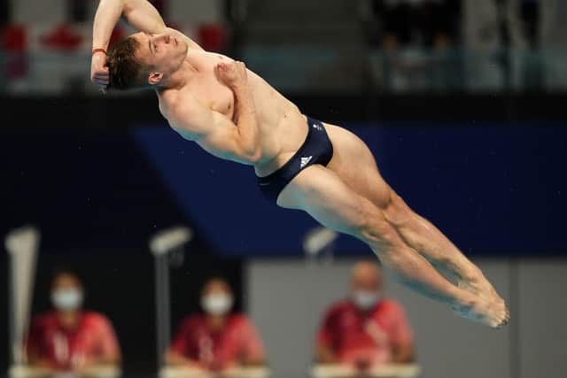 Jack Laugher of Britain competes in men's diving 3m springboard semifinal at the Tokyo Aquatics Centre at the 2020 Summer Olympics, Tuesday, Aug. 3, 2021, in Tokyo, Japan. (AP Photo/Dmitri Lovetsky)