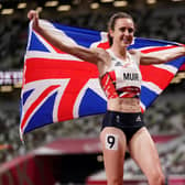 Flying the flag: Great Britain's Laura Muir celebrates after winning the silver medal in the women's 1500m final.