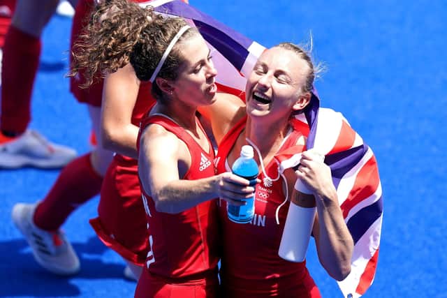 Celebration: Great Britain's Anna-Frances Toman and Hannah Martin celebrate winning bronze at the Oi Hockey Stadium. Picture: PA