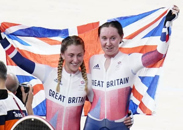 Track stars: Great Britain's Laura Kenny and Katie Archibald celebrate winning gold at the Izu Velodrome. Picture: Danny Lawson/PA