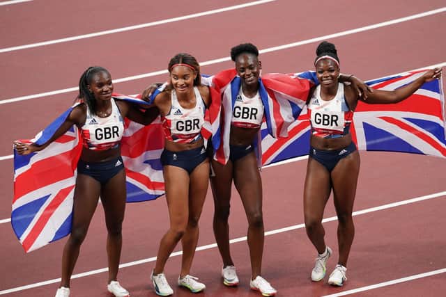 Great Britain's Dina Asher-Smith, Imani-Lara Lansiquot, Daryll Neita, and Asha Philip after winning the bronze medal in the Women's 4 x 100m Relay Final at Olympic Stadium (Picture: PA)