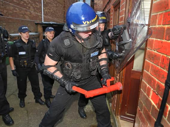 Police officers have co-ordinated major operations nationally, including this raid in Scarborough, to tackle the so-called county lines drugs gangs which have recruited vulnerable young people often from rural communities for their illegal trade. (Photo: North Yorkshire Police)