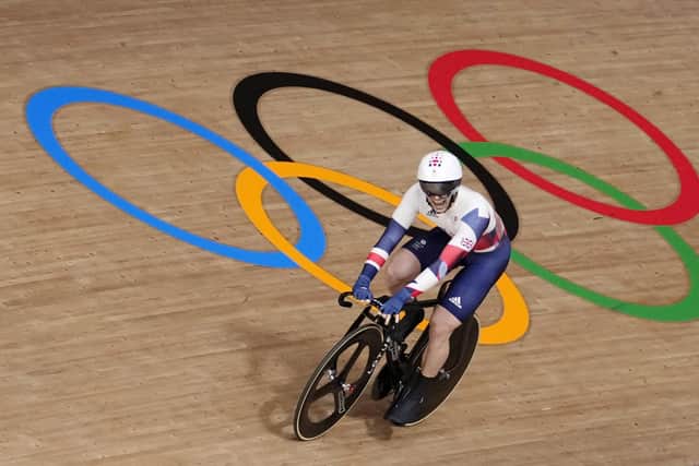 On track for gold: Jason Kenny reacts after winning the gold medal in the track cycling men's keirin race.