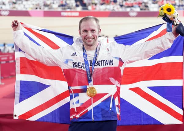 Golden hero: Great Britain's Jason Kenny celebrates after becoming the first GB athlete to win seven Olympic gold medals, at the Izu Velodrome. Picture: Danny Lawson/PA