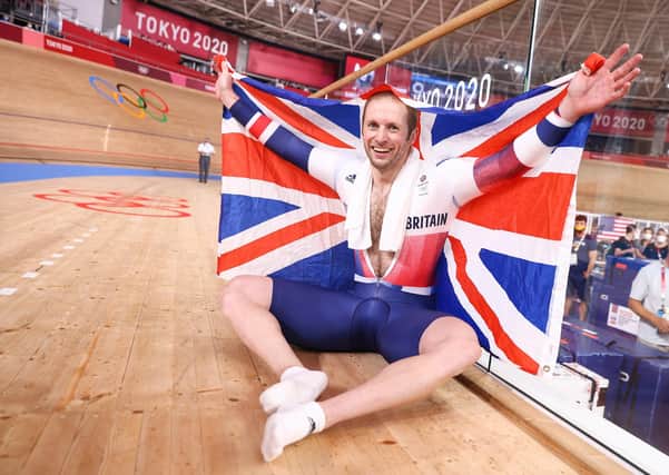 Seventh heaven: Jason Kenny celebrates winning the men's Keirin final to become Olympic champion. Picture: SWPix