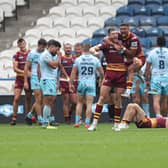 Huddersfield Giants' Sam Wood and Will Pryce celebrate Jake Wardle's match-winning try (PAUL CURRIE/SWPIX)