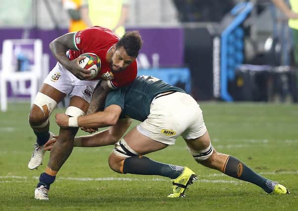 British and Irish Lions' Courtney Lawes (left) is tackled during the Lions Series, Third Test (Picture: PA)