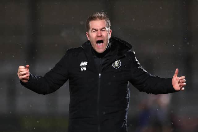 Good start: Harrogate Town manager Simon Weaver saw his side open with a win over Rochdale - but now their next three matches are off due to Covid issues. Picture: Mike Egerton/PA Wire.
