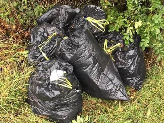 A Leeds couple were fined after dumping rubbish near Withernsea