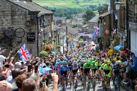 This was the Tour de France peloton riding up Mian Street, Haworth, in 2014. Now the Post office is earmarked for closure.