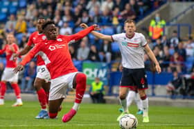 Barnsley's Clarke Oduor on the stretch against Bolton Wanderers. Picture: Bruce Rollinson.