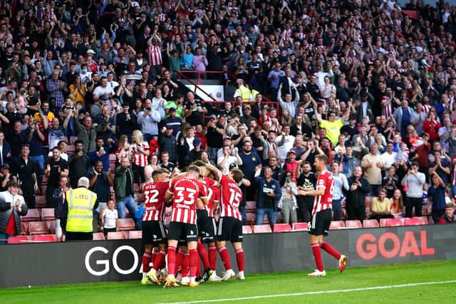 Sheffield United's Rhian Brewster celebrates his goal with team-mates.