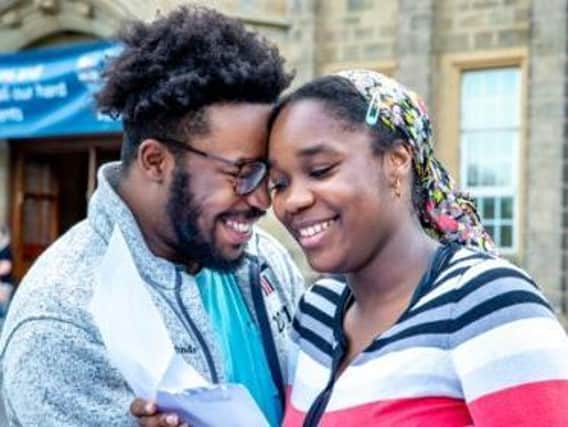 Funmi Ogunde and her brother Seun celebrate her A Level results yesterday