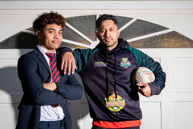 Quentin Laulu-Togaga'e (right) and his son Phoenix (left) of Keighley Cougars are pictured at their home in Sheffield after becoming the third father and son duo to play together in a British rugby league game in a game against Dewsbury Rams in March. (Alex Whitehead/SWpix.com)