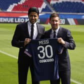Paris match: Lionel Messi and PSG president Nasser Al-Al-Khelaifi with the player's new shirt at the Parc des Princes stadium. The 34-year-old Argentina star Messi signed a two-year deal with the option for a third season after leaving Barcelona. Pictures: AP Photo/Francois Mori