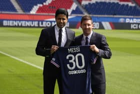 Paris match: Lionel Messi and PSG president Nasser Al-Al-Khelaifi with the player's new shirt at the Parc des Princes stadium. The 34-year-old Argentina star Messi signed a two-year deal with the option for a third season after leaving Barcelona. Pictures: AP Photo/Francois Mori