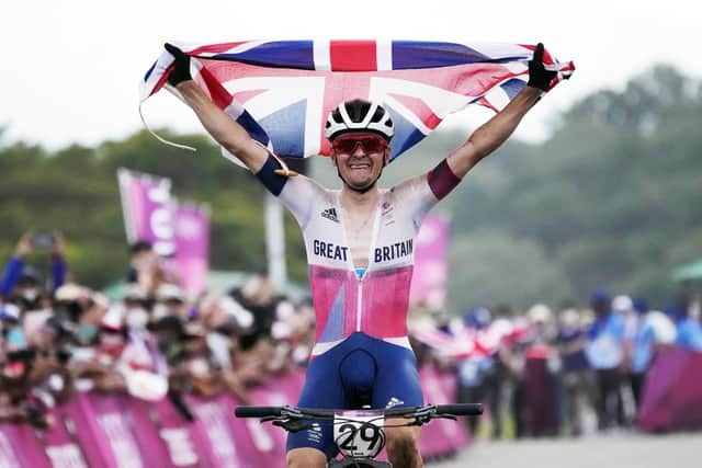 Great Britain's Tom Pidcock celebrates winning the gold medal in the men's cross country mountain biking (Picture: PA)
