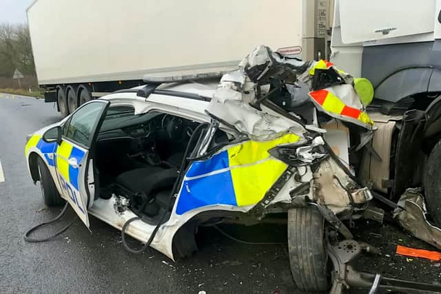 These photos show the wreckage of the police car
