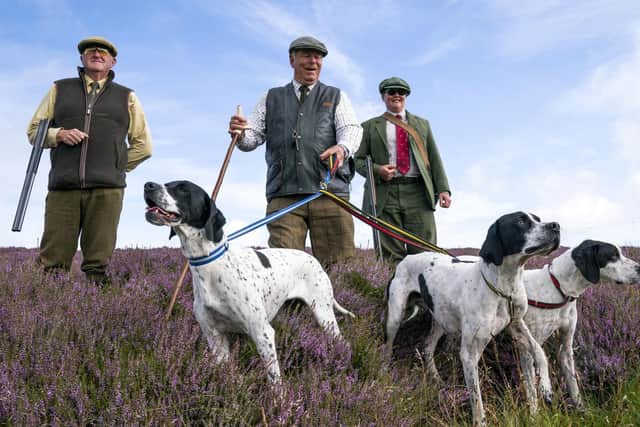Shooting party (from left) Mark Ewart, Peter O' Driscoll and Pam Butler at Byrecleugh Farm, part of the Roxburghe Estates near Duns in the Scottish Borders, as the Glorious 12th, the official start of the grouse shooting season, gets underway.  Jane Barlow/PA Wire