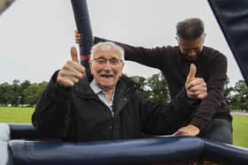 D-Day Hero Ron Shelley, alongside his son Peter, fulfilling a lifelong dream to ride a hot air balloon at York Racecourse.