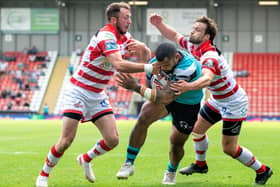 Tough going: Manu Ma'u pushes through for Hull's third try against bottom club Leigh Centurions.  Picture: Bruce Rollinson