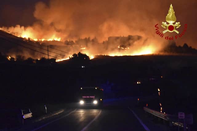 Wild fires have been devastating parts of Italy as temperatures reach record levels.