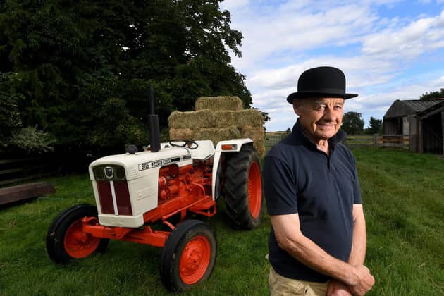 Bob with one of his vintage tractors