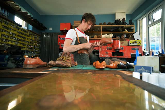 Shipley cobbler Dean Westmoreland at his reapir shop. Picture : Jonathan Gawthorpe
