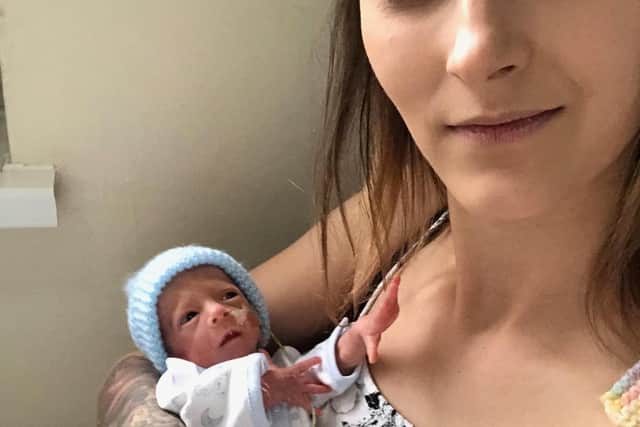 Danielle Forrester with son Logan shortly after his birth