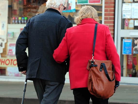 Library image of pensioners walking in South Derbyshire. It's important to have a clear idea of how much cash you will need to live on after retirement.
