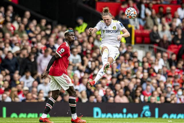 Leeds United's Luke Ayling clears from Paul Pogba. (Picture: Tony Johnson)
